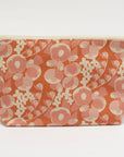 Floral patterned pouch on a white background