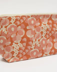 Floral patterned pouch on a white background