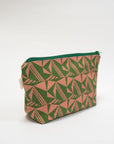 Green and pink geometric patterned pouch on a white background