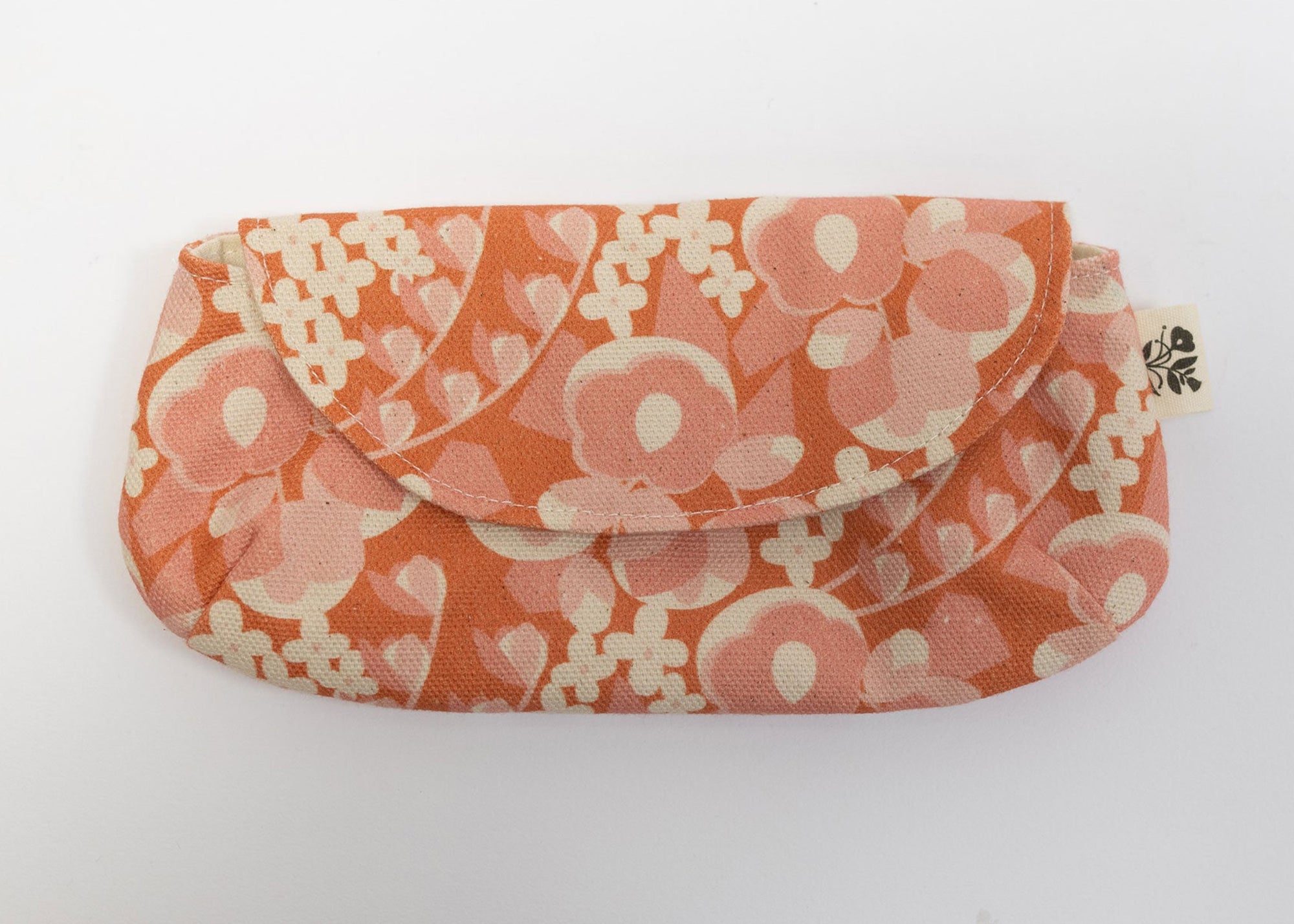 Floral patterned pouch on a white background