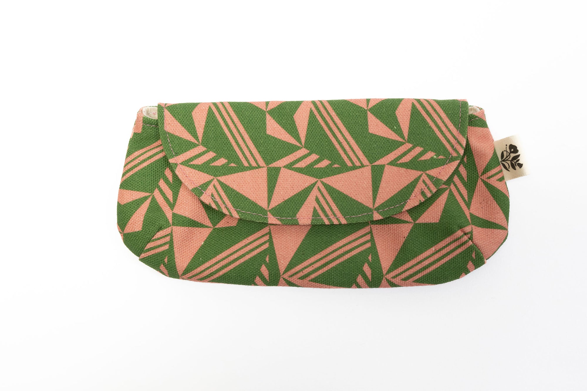 Green and pink geometric patterned pouch on a white background