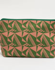 Green and pink geometric patterned pouch on a white background
