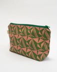 Green and pink geometric patterned pouch on a white background