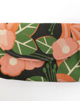 Floral-patterned pouch on a white background
