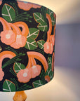 Lampshade with floral pattern on a plain background